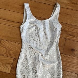 Tight fitted white cheetah print dress.